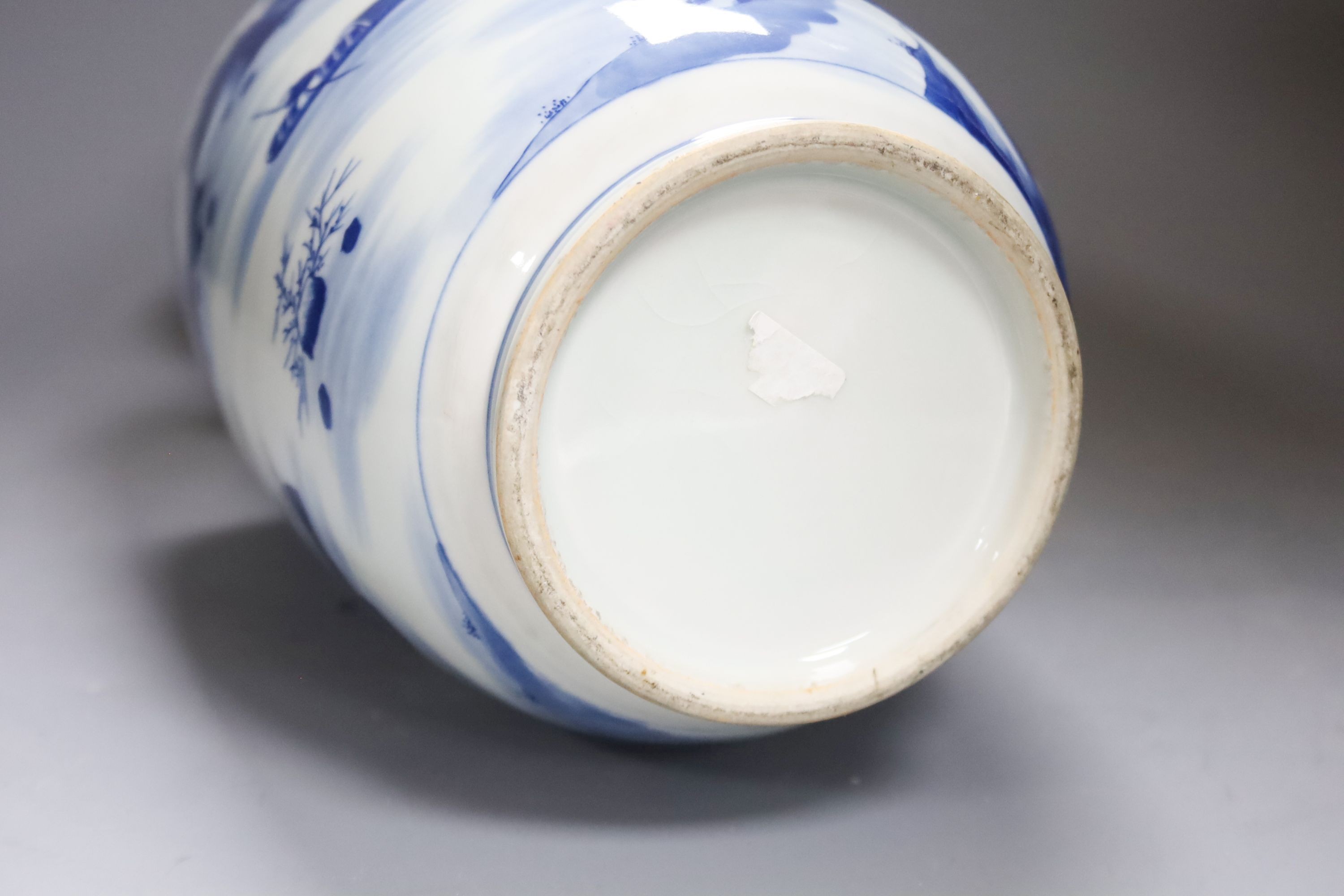 A Chinese blue and white rouleau vase and two jars, 19th century and later, 38cm